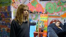 Florrie in the band room of Headfort School with gap year student Olivia